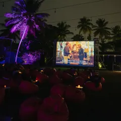 Movie magic under the stars. Our lawn transforms into an open-air cinema with comfy beanbags for the perfect viewing experience.