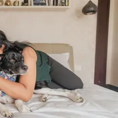 A quiet, loving hug on the bed. At-home sessions allow for an intimacy that is hard to replicate elsewhere, capturing the deep bond you share with your pet in your most personal space.