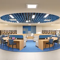 A concept render for the library at GL Bajaj University’s Law Institute. The design features a central, circular seating arrangement with integrated desks, creating a focal point for collaborative research and study under a modern, baffled ceiling.