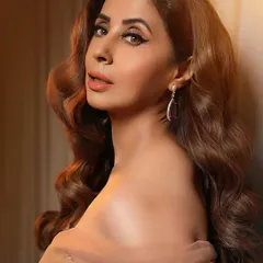 A beautiful shot of Urmila Matondkar after I did her haircut and color. The style features soft, romantic waves that complement her elegant look.