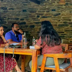 Leaning in to listen. This is a typical scene from our feedback driven writing retreat groups, where writers share their work and receive thoughtful, honest critiques. The focus is always on helping each other make the story stronger.