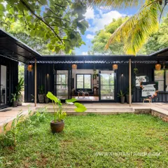 I transformed shipping containers into this lush office oasis. The U-shaped design creates a private central courtyard, offering a peaceful and green environment for a productive workday.