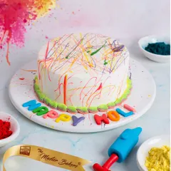Celebrate Holi with a splash of color. This cake is decorated to look like it's been splashed with gulal, and even comes with a small fondant pichkari (water gun) for a playful touch.