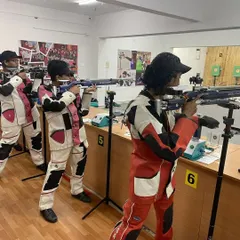 A group of our female athletes training together on the 10m range. We foster a supportive team environment where shooters can learn from each other while honing their individual skills.