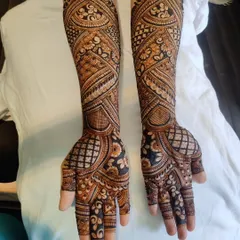 Another angle of this stunning bridal piece, highlighting the consistency of the pattern wrap around the arm.