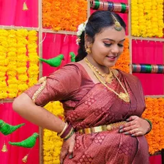 This mom-to-be looks absolutely radiant. The makeup for her baby shower was kept elegant and traditional, with a focus on flawless skin and soft, defined features.