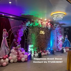 I create magical princess-themed birthday parties like this one. This premium setup includes a sparkling sequin backdrop, a balloon arch in the theme's colors, and life-sized cutouts of popular princesses to complete the fairy tale look.