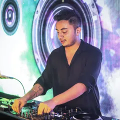 Focused on the mix. Every event gets my complete attention to detail, ensuring the music flows perfectly throughout the night.