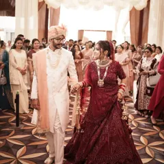 The walk together as husband and wife. We capture this significant moment as the couple makes their way through the aisle, surrounded by their loved ones.