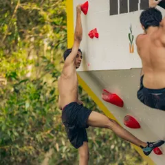 A young climber shows intense focus as he tackles a difficult section of the wall. Our events are a platform for athletes of all ages to test their skills.
