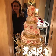 I was so happy to be a part of Shloka and Akash Ambani's engagement celebration with this grand floral cake. It was displayed on a beautiful gold cart, adorned with countless handmade sugar flowers in shades of pink and peach.