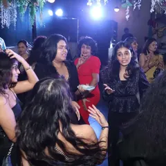 A group of friends enjoying the music and the atmosphere on the dance floor. My goal is to create a space where everyone feels comfortable letting loose.