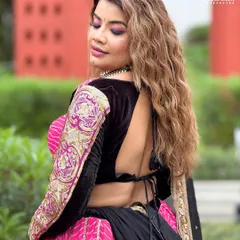 A back view of my traditional Navratri look, showcasing the intricate embroidery on the blouse and the flow of the lehenga.