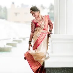 The classic combination of a gold and red Kanchipuram silk saree is a bridal favorite. Here, I've created a radiant look with warm, golden tones on the eyes and traditional temple jewellery to complete the divine Muhurtham appearance.