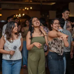 Capturing the fun moments between songs. It's a party where everyone feels like part of the action.