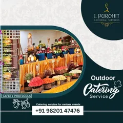 I specialize in outdoor catering, creating beautiful buffet displays like this fruit and salad bar. I ensure all safety and hygiene protocols are followed, even in an open-air setting.