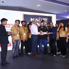 Our students and faculty receiving an award on stage at the National Fashion Show Season 3 for their exceptional hairstyling work.