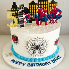 This Spider-Man cake features a city skyline backdrop, making it feel like he's swinging right through the city.