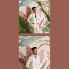 A stylish solo portrait of the groom, Kapil, against a vibrant, leafy wallpaper. We use the environment to create visually interesting and modern portraits.