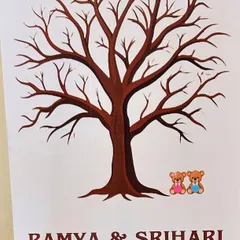 A creative guest book alternative for a baby shower. Guests can leave their thumbprint "leaves" on the tree to create a beautiful keepsake for the family.