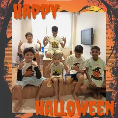Our spooky and fun Halloween workshop ends with a group of proud monsters showing off their custom-painted t-shirts. It is all about creative fun and making friends.