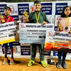 The winners of our prize money tournament proudly displaying their cheques and trophies. We had a winner, runner up, and bronze medalist, each earning a cash prize for their excellent performance on the court.