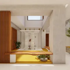 At the center of the home, we designed a glass-enclosed Puja room that sits within the courtyard. This modern interpretation of a sacred space allows it to be a visual focal point, connecting spirituality with daily life.