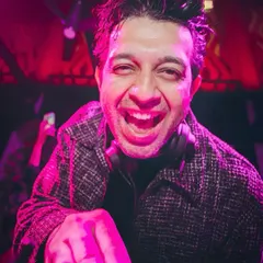 This is me in my element, feeding off the crowd's energy. I'm not just playing songs; I'm right there with you, making sure the party never stops.