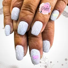 Butterflies adding a touch of elegance. This beautiful design features intricate white patterns on a matte base with tiny butterfly accents.