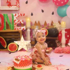 This happy smile says it all! A "One in a Melon" themed cake smash is such a fun and colourful way to celebrate a first birthday. I love capturing the pure joy as they dig into their very own watermelon cake.