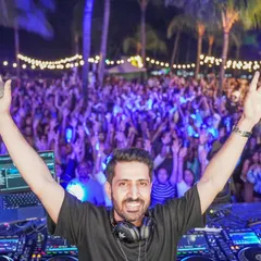 Arms up, mic in hand, celebrating with the massive crowd in Mauritius. This was my first time performing there, and the energy was unforgettable. It's a privilege to connect with so many people through music.