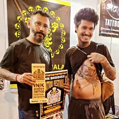 Here is the award-winning healed tattoo, a large piece on the client's torso. Healed tattoos are the true test of quality, showing how the ink has settled into the skin over time.