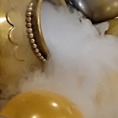 This is a close-up of the dry ice fog effect I use. The thick, white smoke pours from a decorative pot, creating a magical, cloud-like layer on the floor that is completely safe for indoor events.