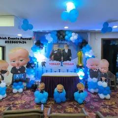 This was a fun Boss Baby themed first birthday party I did for twins. I created a complete stage setup with large character cutouts, a personalized backdrop, and balloon pillars to transform the space.