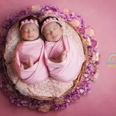 There's something truly magical about newborn twins. We specialize in creating serene and beautiful portraits like this one, ensuring your little ones are safe and comfortable throughout the session at your home or our studio.