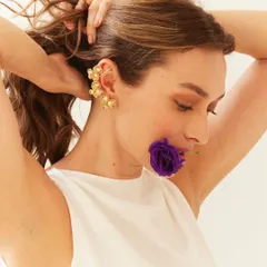 Art direction for jewelry brand Studio Metallurgy. We used fresh flowers as props to create a soft, romantic mood that contrasts with the metal.
