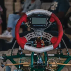 A detailed view of the steering wheel and MyChron data logger. This is the driver's command center, where they receive real time information during a race.