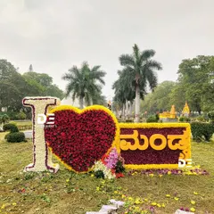 To celebrate our community pride, I designed and built this "I ❤️ Mandya" sign, with the text in Kannada, entirely from flowers. This installation became a beloved photo spot at the flower show, showing how floral art can bring people together.