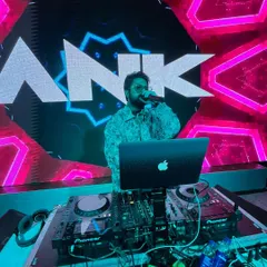 On the mic at the Dehradun NYE party. I make sure to engage with the crowd and act as an MC to keep the energy high.
