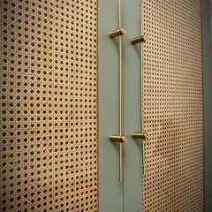 We believe even storage should be a statement piece. For this wardrobe, we combined natural cane webbing with a soft sage green finish and custom brass handles, creating a piece that’s both functional and a beautiful focal point.