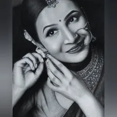 This is the completed charcoal and graphite portrait of a bride. I paid special attention to the textures, from the soft shading on her skin to the intricate sparkle of her traditional jewelry, creating a piece that is both realistic and full of life.