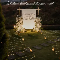 The journey to "yes". I designed this entire scene with a custom "To The Stars" backdrop, a pathway of ambient ground lighting, and elegant floral arrangements to build anticipation for the big question.
