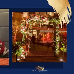 A closer look at a grand floral entrance I designed for a cocktail event. The lush arrangement of multi-colored flowers and greenery creates an inviting and luxurious first impression for arriving guests.