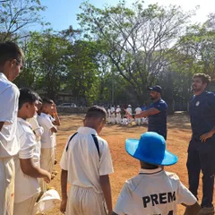 A close-up of the post-match talk with guest coach Siddharth Chitnis. He is sharing his experiences about the grind of professional cricket, offering invaluable wisdom to our young players.