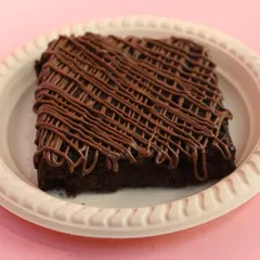 A classic chocolate brownie with a rich chocolate drizzle. This eggless treat is fudgy, moist, and deeply satisfying.