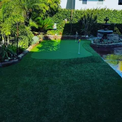 A view showing the different hole placements on this custom putting surface, designed for comprehensive practice.