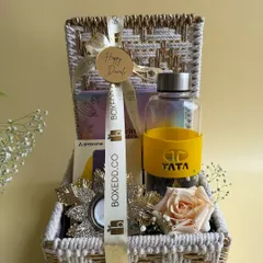 We love bringing a brand's vision to life. This custom Diwali hamper for TATA features a branded water bottle and other curated items, all presented in a beautiful woven basket that reflects both quality and festive warmth.