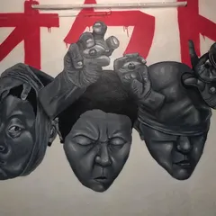 This mural, titled 'STATES OF MIND', is a large-scale piece exploring different human emotions. I used varied shading techniques on each face to give them a distinct character and depth.