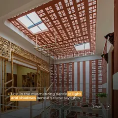At the Manjunath Residence, the ceiling combines filler slabs with skylights. This not only reduces the weight of the concrete structure but also allows pockets of natural light to filter down, creating a mesmerizing dance of light and shadow.