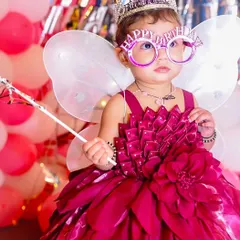 Another adorable shot of the birthday princess, this time with fun "Happy Birthday" glasses, ready to party.